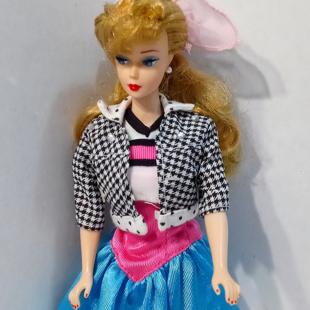 1958 reproduction Barbie with Pear earings